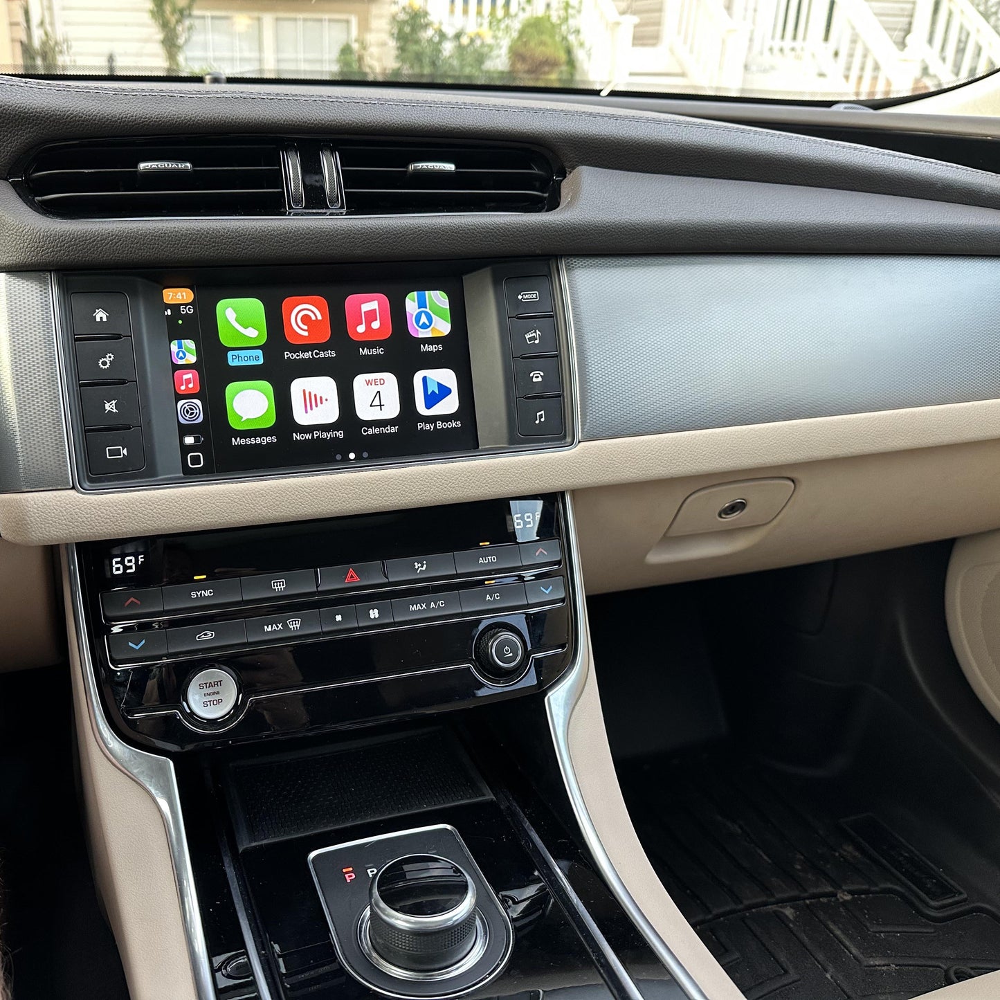 Jaguar interior displaying the integrated wireless Android Auto interface on the infotainment screen.