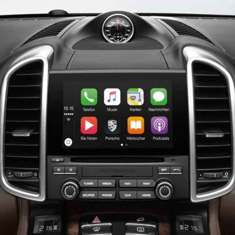 Porsche dashboard with integrated wireless Apple CarPlay interface displayed on the center console screen.