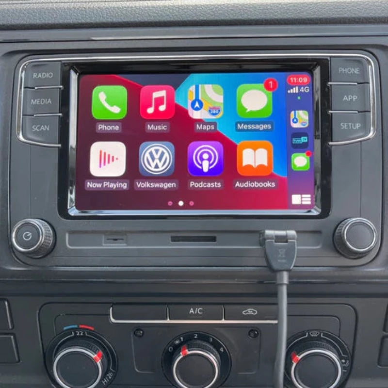Volkswagen dashboard with the integrated wireless Apple CarPlay interface displayed on the center console screen.