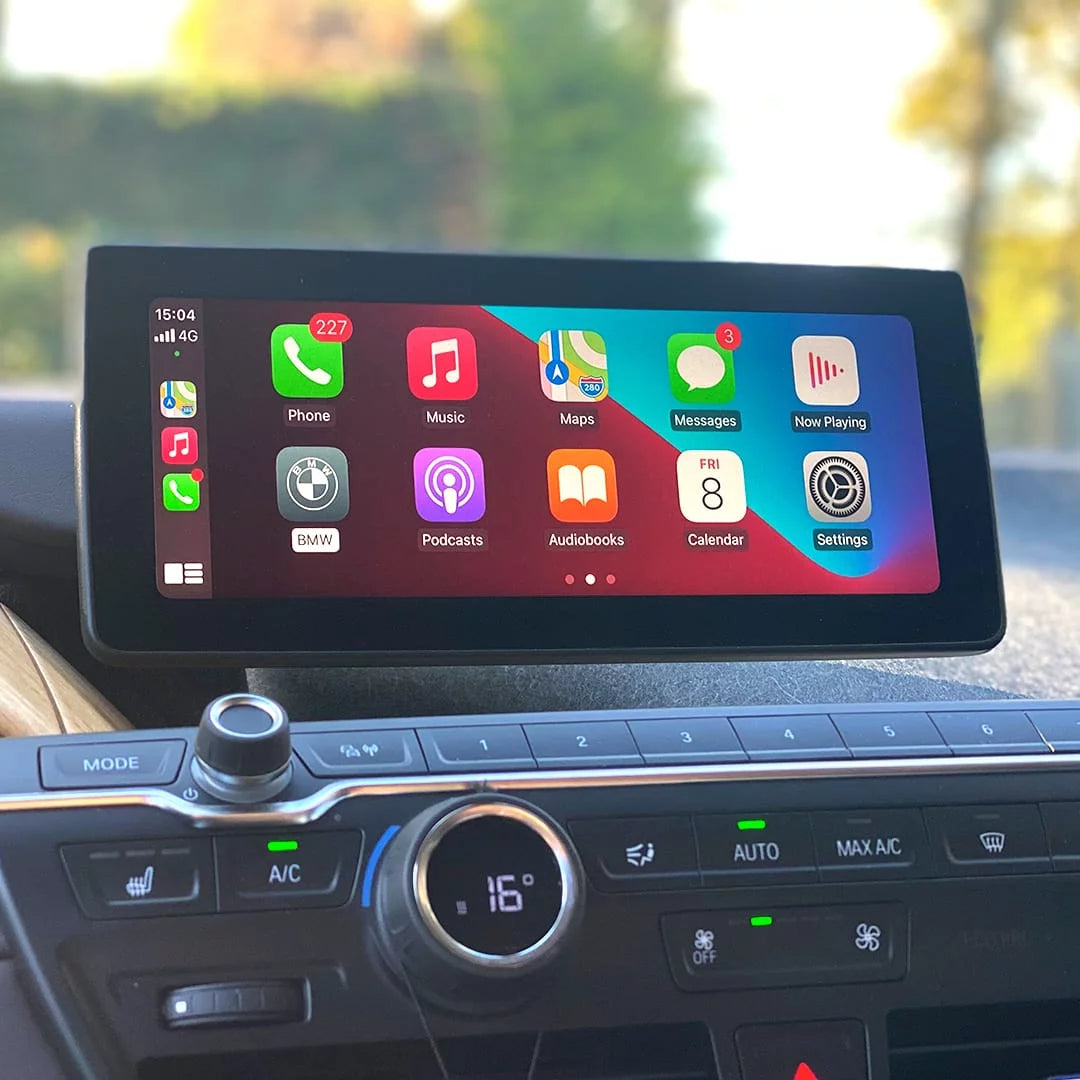 Lexus interior dashboard showing the integrated wireless Apple CarPlay interface on the infotainment screen.